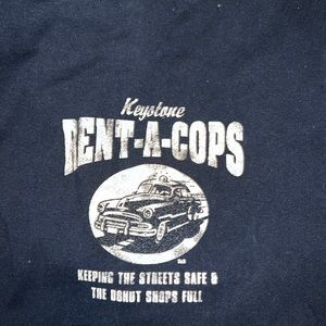 Navy blue long sleeved “Rent-a-Cops” tee shirt for men in size L. Fits L and XL.